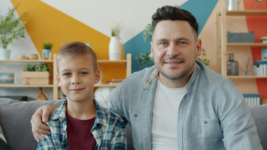 family with children smiling